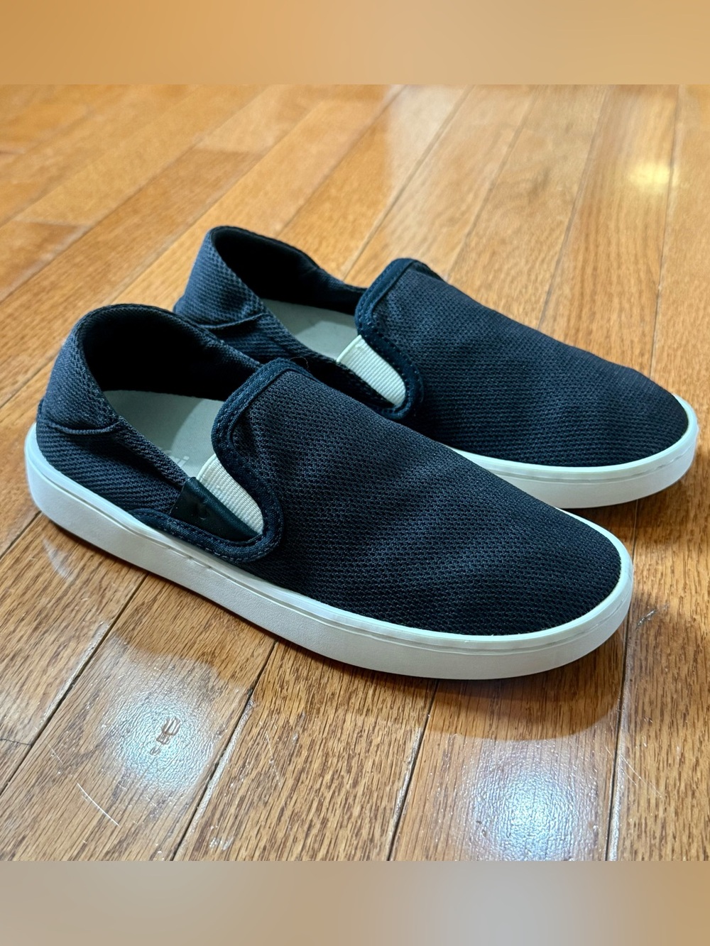 OluKai Black Slip-On Canvas Sneakers with White Sole